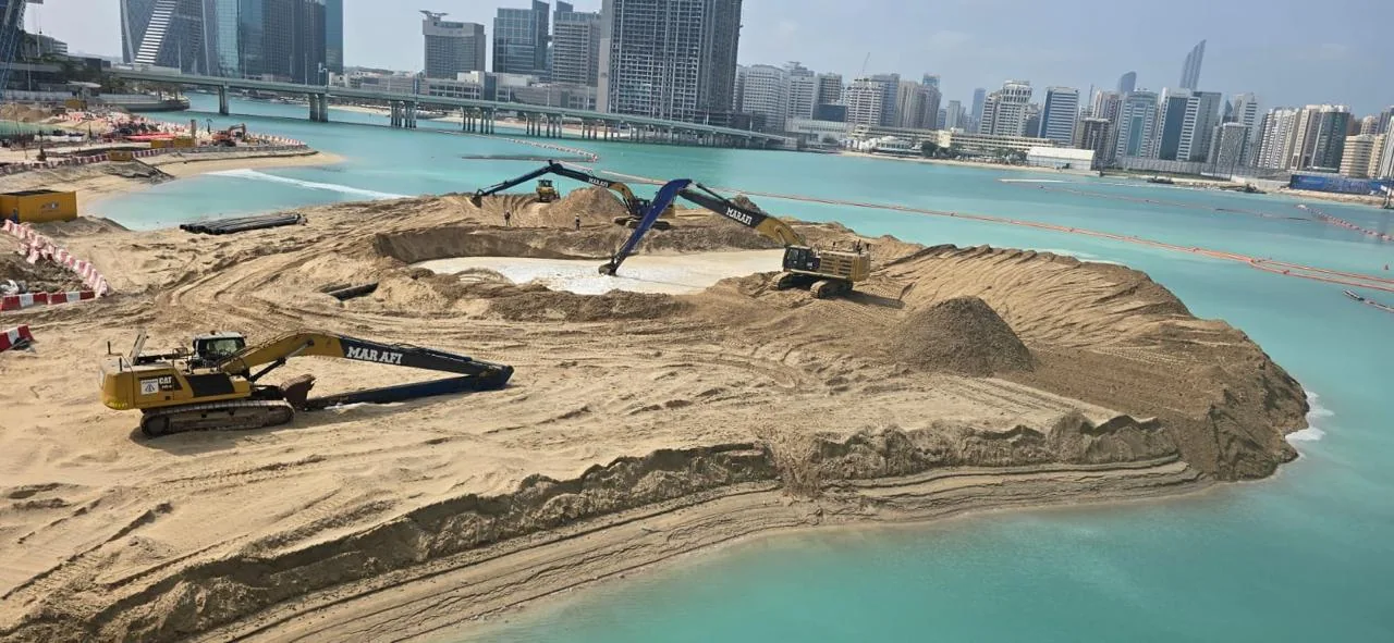 Earthworks and excavators on the Al Maryah Project Dive work platform.