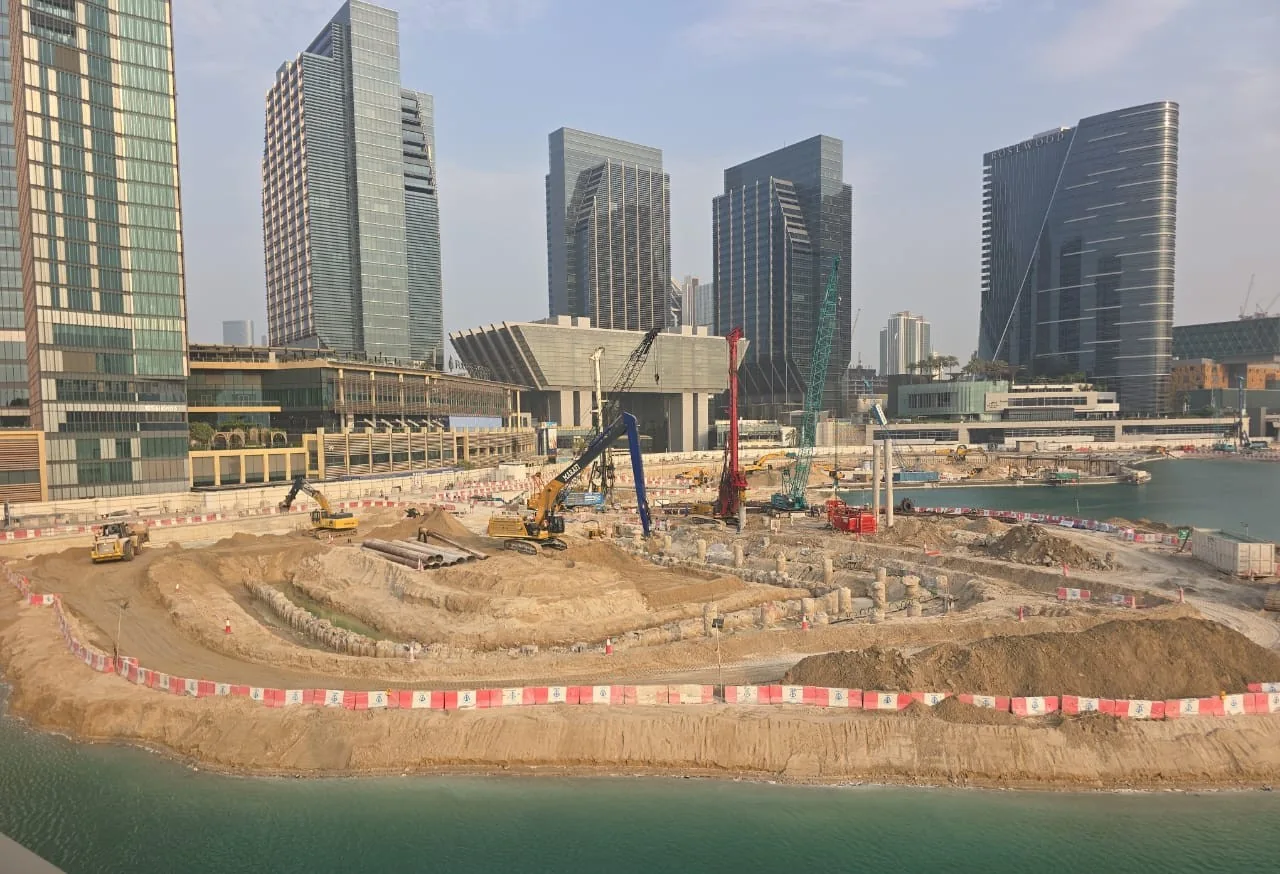 Marine construction work platform and surrounding buildings at Al Maryah Project Dive.