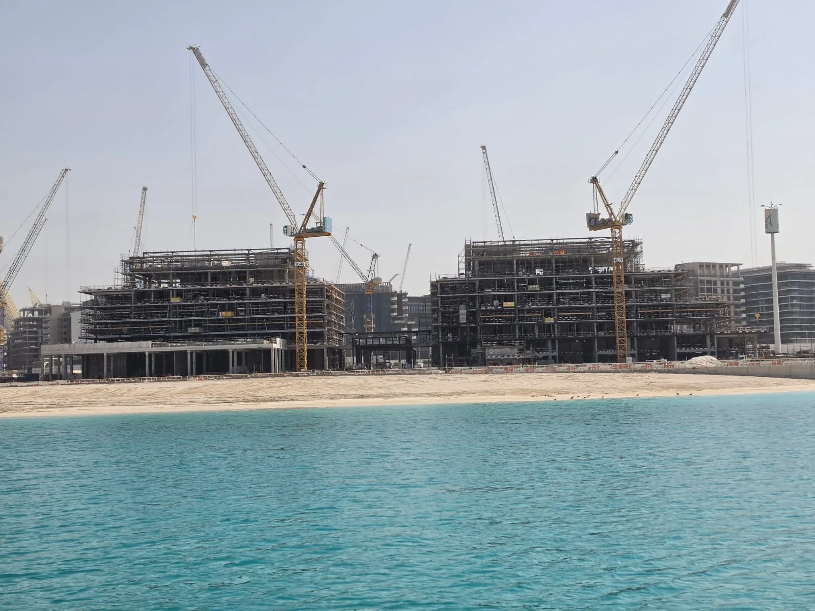 Beachfront construction viewed from the water at the Mamsha and Nobu project.
